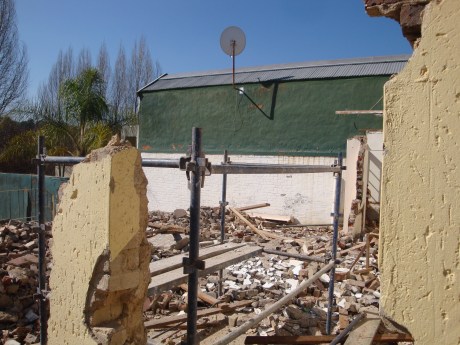 The west wall of the house on our right.  We'll not see this once our new house is built.