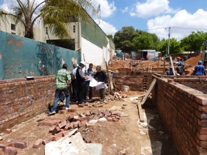 Discussion taking place where the scullery will be.