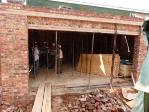 Concrete lintels in place above garage. February 27th.