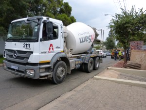 Cement truck in the street.