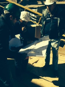 Bernard and Nigel - current site manager - in discussion with an electrician.