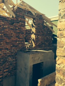 Steps (plastered) up to guest suite.