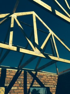 Rafters against the winter sky.