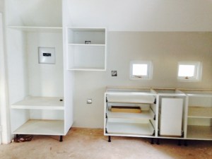 The start of the kitchenette cupboards in the guest suite.