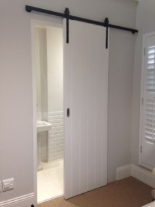 Barn sliding door in bedroom 3.